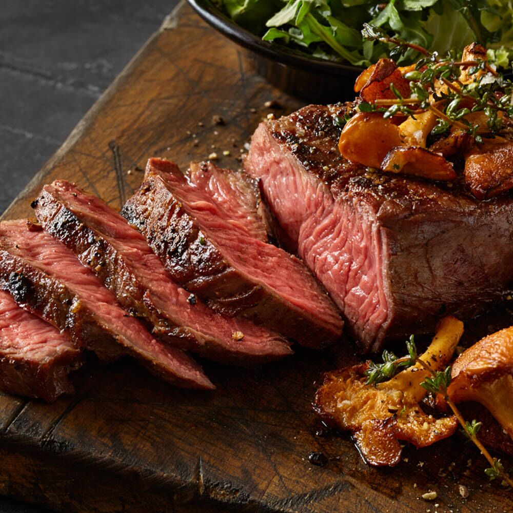 bison new york steak perfectly sliced